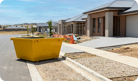 Skip bin hire in Moncrieff placed outside a home renovation site for construction waste removal